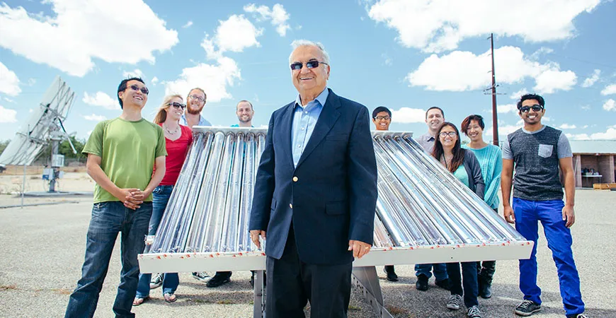 Roland Winston with his research team